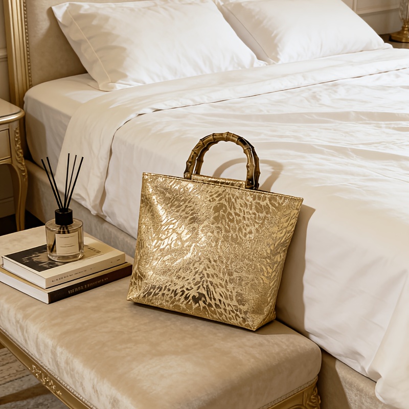 Luxury Bags Reseller - Lichte, luxe handtas van metallic goudkleurig